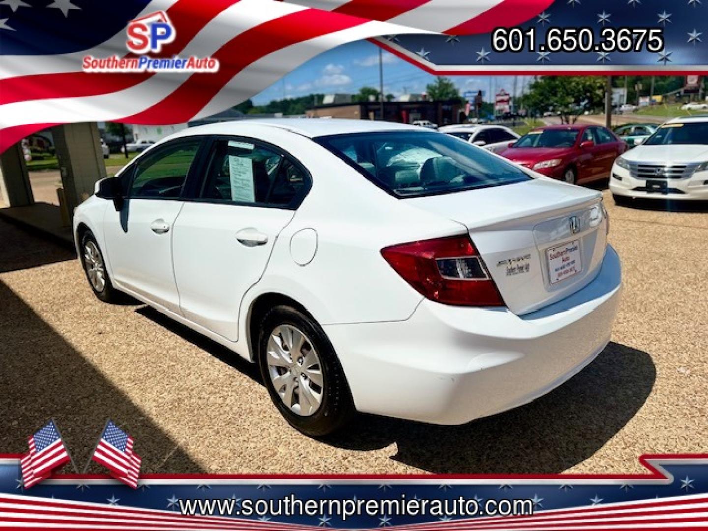 2012 WHITE HONDA CIVIC LX LX (2HGFB2F51CH) with an 1.8L L4 SOHC 16V engine, 5-Speed Automatic transmission, located at 922 W. Beacon St., Philadelphia, MS, 39350, (601) 650-3675, 32.770447, -89.127151 - Title: 2012 Honda Civic LX Sedan Year: 2012 Make: Honda Model: Civic Engine: 1.8L L4 SOHC 16V Body: SEDAN 4-DR Transmission: 5-Speed Automatic Drive Type: FWD Mpg City: 28 Mpg: 39 Trim: LX Sedan - Photo#3